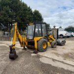 Lewis Badger 4WD Front Loader Backhoe With 2023 Suton Hydraulic Sweeper Bucket - Image 8