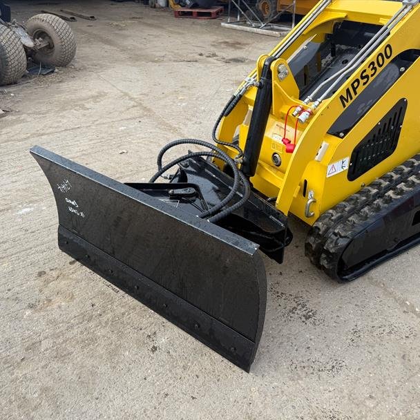 Reversible wear blade snow plough attachment for compact loaders