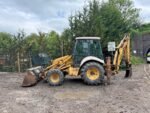 NEW HOLLAND NH95 4WD FRONT LOADER BACKHOE - Image 2