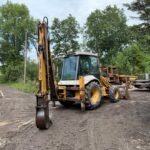 NEW HOLLAND NH95 4WD FRONT LOADER BACKHOE