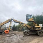 2008 CATERPILLAR M318D-MH WHEELED MATERIAL SCRAP HANDLER EXCAVATOR